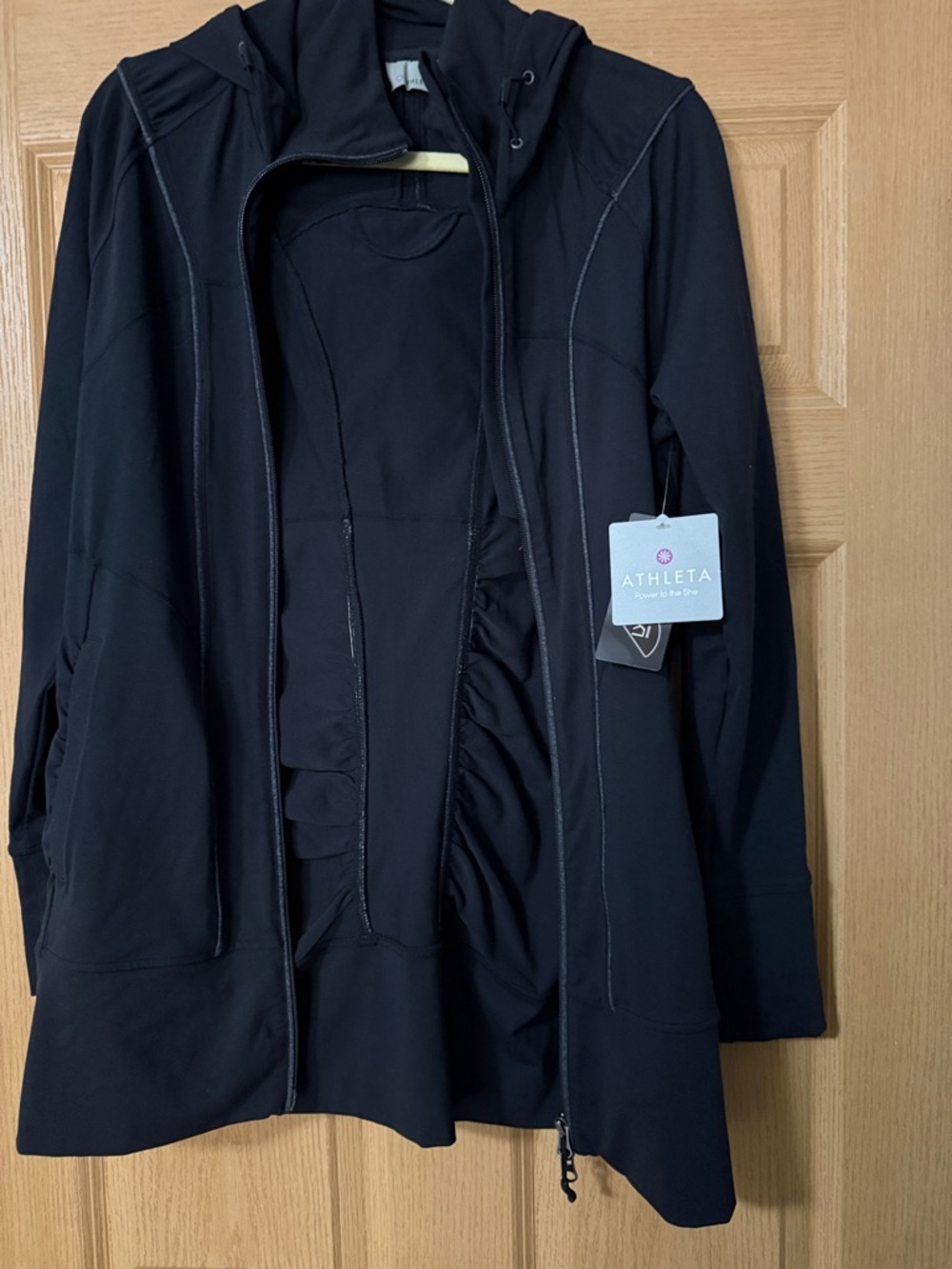 Athleta Black Hooded Zip-Up Jacket with Subtle Seam Detail